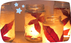 Portavelas con hojas secas